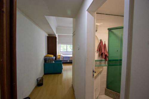 a hallway of a house with a room with a room at APT Perto da praia de Copacabana in Rio de Janeiro