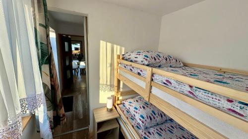 Postel nebo postele na pokoji v ubytování Leśna Oaza