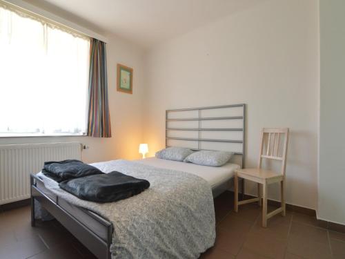 Katil atau katil-katil dalam bilik di Holiday Home in Heppenbach with garden