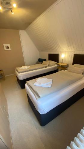 Ein Bett oder Betten in einem Zimmer der Unterkunft Pension Julia