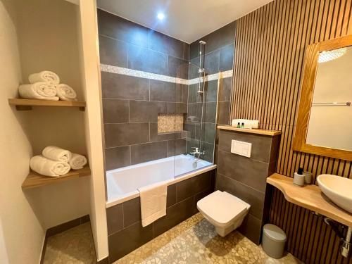 Ένα μπάνιο στο Apartamenty Zaliński Agroturystyka