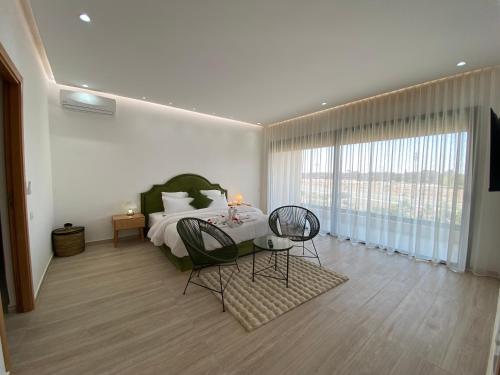 Ένα ή περισσότερα κρεβάτια σε δωμάτιο στο Villa Dounia Nuova