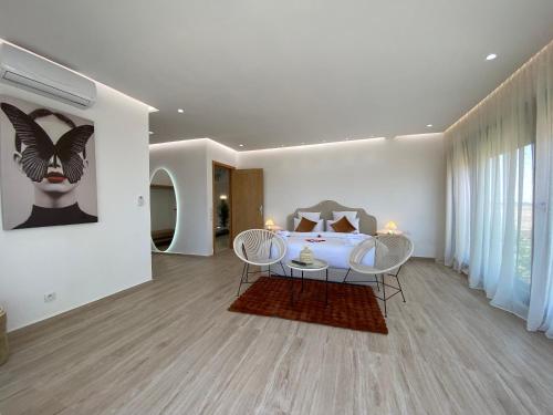 Ένα ή περισσότερα κρεβάτια σε δωμάτιο στο Villa Dounia Nuova