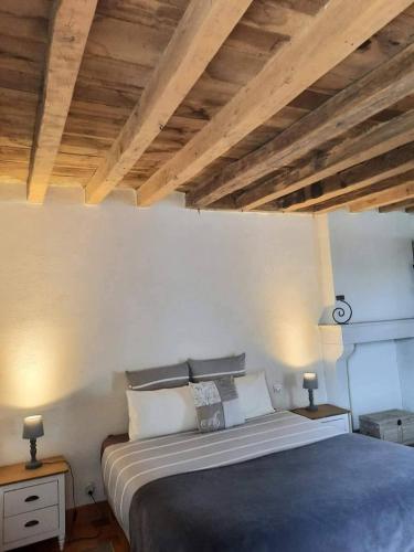 Postel nebo postele na pokoji v ubytování Moulin de Janlard