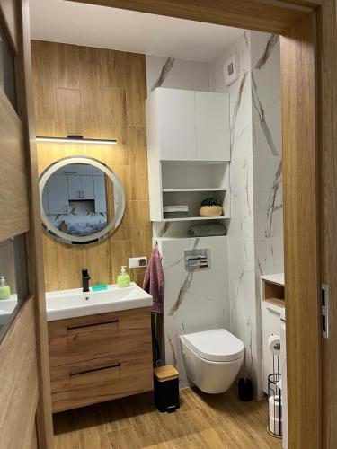 Koupelna v ubytování Apartament Łyna