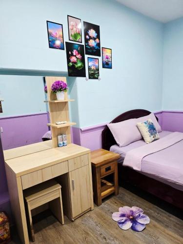 Postel nebo postele na pokoji v ubytování Thiên Sơn Hotel Côn Đảo