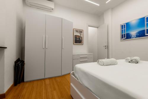 Ένα ή περισσότερα κρεβάτια σε δωμάτιο στο Sea side apartment - new bright home