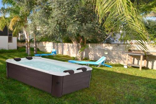Boomerang Villas 5 - Villa Mina con Jacuzzi nel Boomerang Village a Torre Colimena