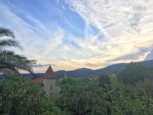 a view of a town with a building and trees at Villa in Fayence with Provençal Charm in Fayence