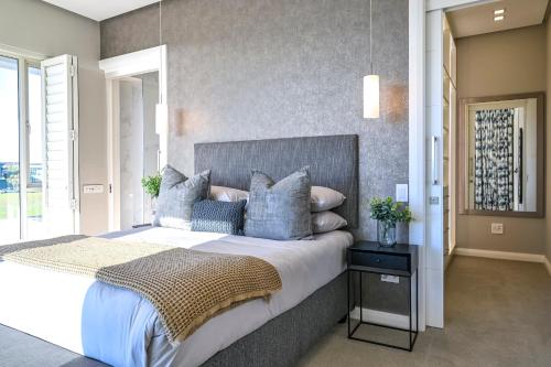 GND Properties Luxury Holiday Homeにあるベッド