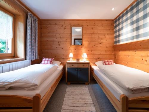 Postel nebo postele na pokoji v ubytování Chalet in Kirchberg near Ski Gondola