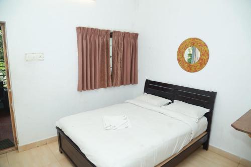 Cama o camas de una habitación en Rainforest inn