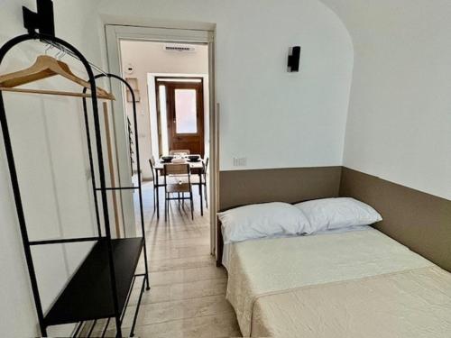 Ένα ή περισσότερα κρεβάτια σε δωμάτιο στο Casa Lucid'Amare relax, sea at Isola delle Femmine