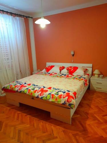 Ένα ή περισσότερα κρεβάτια σε δωμάτιο στο Apartments Vesna