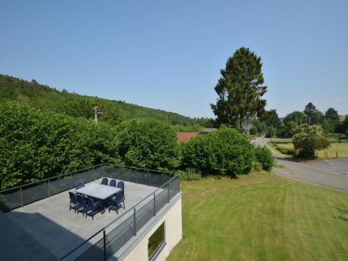 an overhead view of a table on the roof of a house at Spacious retreat, Daverdisse in Daverdisse