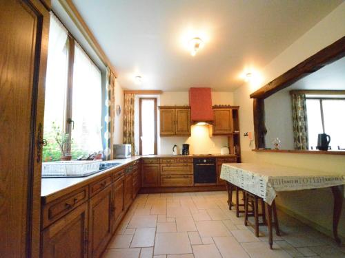 a kitchen with a sink and a counter top at Spacious retreat, Daverdisse in Daverdisse