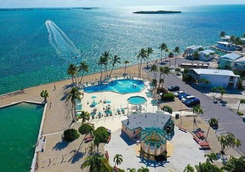 an aerial view of a resort near the ocean at Oceanview Retreat with 60ft Seawall in Cudjoe Key