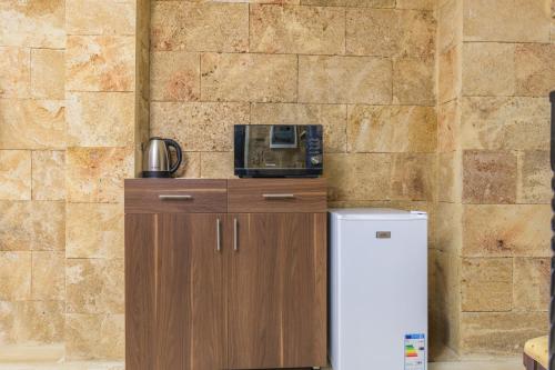 Η κουζίνα ή μικρή κουζίνα στο Casa Kik Apartments in Mina Tripoli