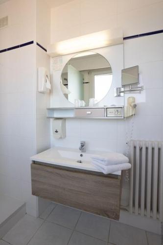Ένα μπάνιο στο Hotel De La Mer