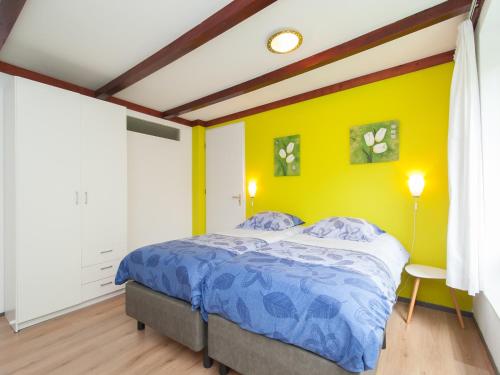 Ένα ή περισσότερα κρεβάτια σε δωμάτιο στο Farmhouse Stay near Dunes