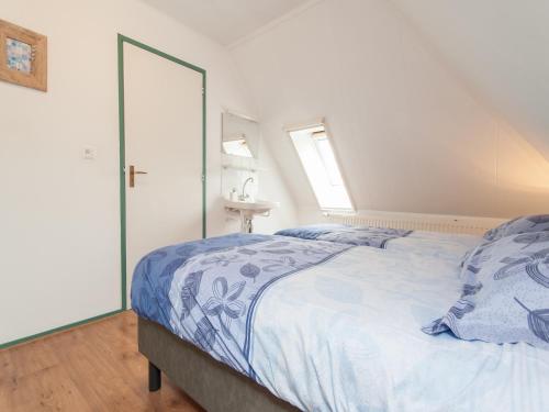 Ένα ή περισσότερα κρεβάτια σε δωμάτιο στο Farmhouse Stay near Dunes