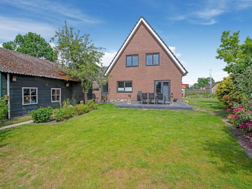 a house with a yard in front of it at Group House in Lemele near Heuvelrug in Lemele