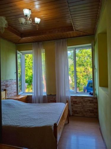 Ένα ή περισσότερα κρεβάτια σε δωμάτιο στο Jantu guest house