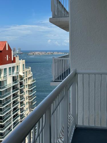 a view of the ocean from a balcony of a building at Stunning view from 42nd floor, Brickell-Miami financial district free self-parking spot, sleeps 4 in Miami