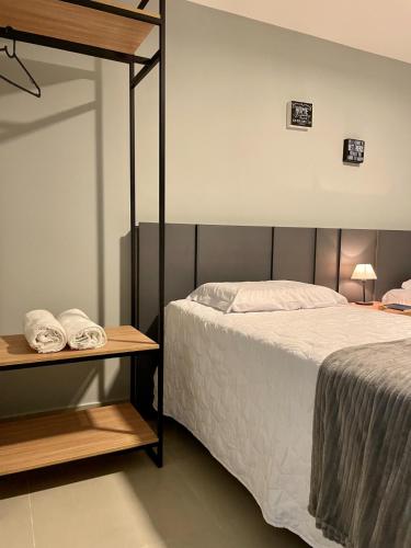 Ένα ή περισσότερα κρεβάτια σε δωμάτιο στο Campina Room Service