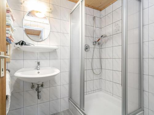 a bathroom with a shower and a sink at Am Bauernhof Top 1 in Alpbach