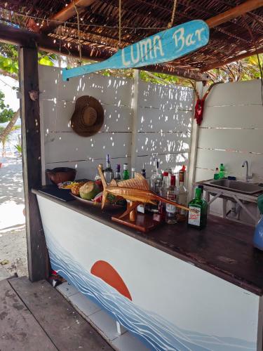 a food stand with a sign that reads lunch box at Hotel xahuayxol in Mahahual