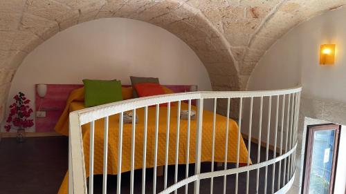 Ένα ή περισσότερα κρεβάτια σε δωμάτιο στο casetta sole