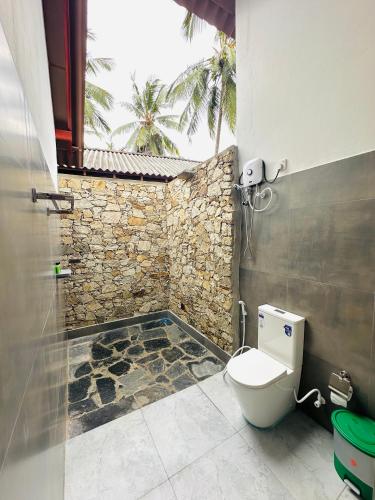 Un baño de Mango Tree House