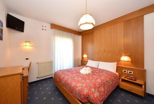 Al Piccolo Hotelにあるベッド