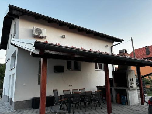 a group of birds sitting on top of a house at Kraljev Vrh Apartments in Kraljev Vrh