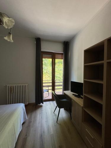 Albergo LA COLDRAにあるベッド