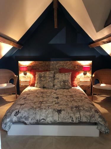 Postel nebo postele na pokoji v ubytování Maisonnette de campagne avec jardinet