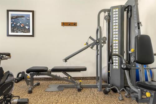 a fitness room with a gym with tread machines at BEST WESTERN PLUS Saint John Hotel & Suites in Saint John