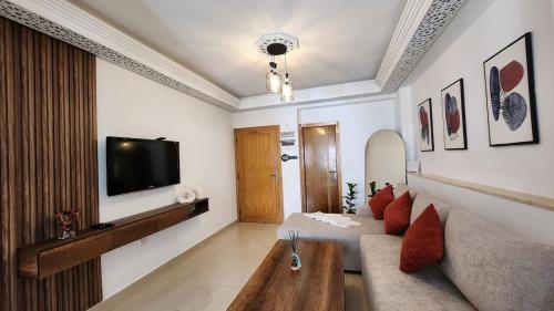 TV a/nebo společenská místnost v ubytování Cosy and central Condo with terace