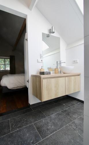 Kuchyň nebo kuchyňský kout v ubytování B&B Hoogh Belgeren