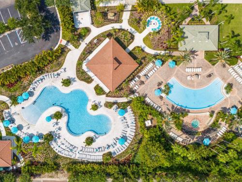 an overhead view of a pool at a resort at Pool*Top Floor*Forest Views*Balcony*VistaCay in Orlando