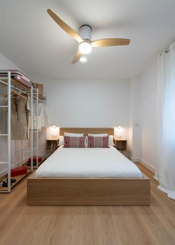 Ένα ή περισσότερα κρεβάτια σε δωμάτιο στο Apartamentos Lang