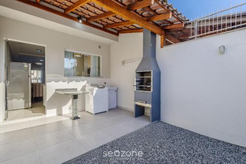 Φωτογραφία από το άλμπουμ του Casa c/ 2 Suítes e Churrasqueira LRM0226 σε Meia Praia
