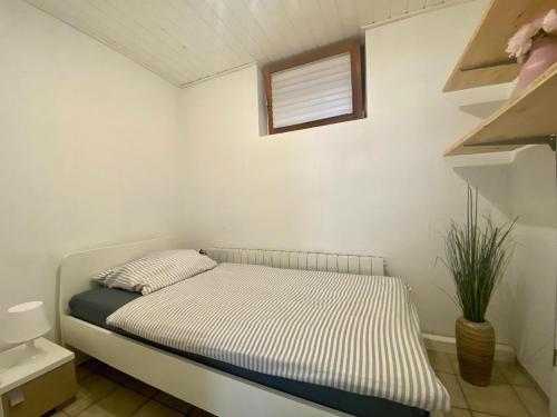 Ένα ή περισσότερα κρεβάτια σε δωμάτιο στο Ferienwohnung Geiger