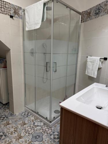 a bathroom with a shower and a sink at casa vacanza serena in Palazzago