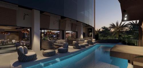 Bazén v ubytování Onomo Allure Abuja AATC Hotel nebo v jeho okolí