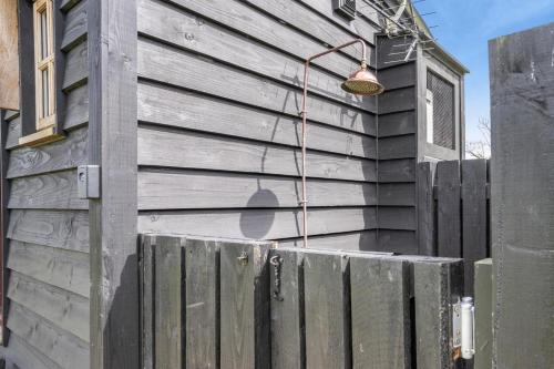 a building with a street light on the side of it at The Sheep Pen in Bronllys