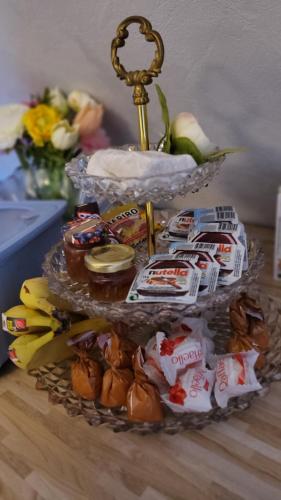 a tray of food on top of a table at Biggy's Apartment in Selb