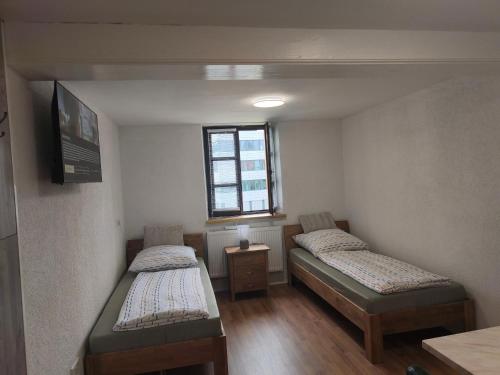 Ein Bett oder Betten in einem Zimmer der Unterkunft Pension Xiang-Ming