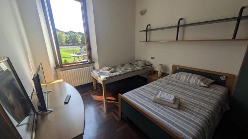 Ένα ή περισσότερα κρεβάτια σε δωμάτιο στο Crespi Apartments Six